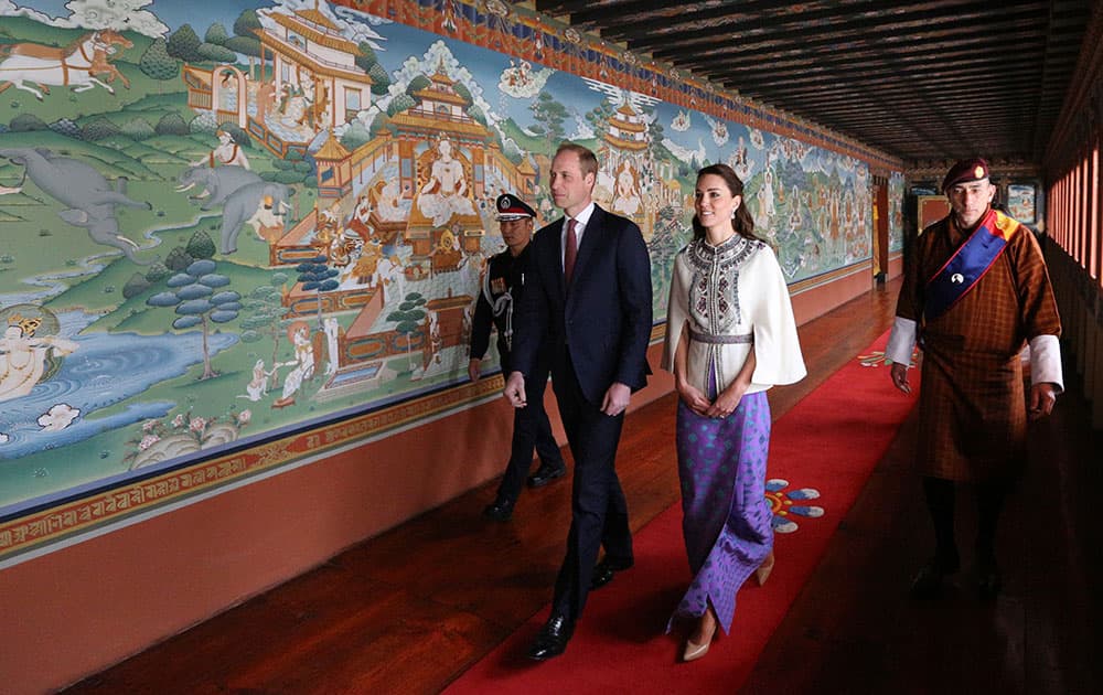 this photo provided by Royal Kingdom of Bhutan, Britain's Prince William, left, and his wife Kate, Duchess of Cambridge are seen in Thimphu, Bhutan.