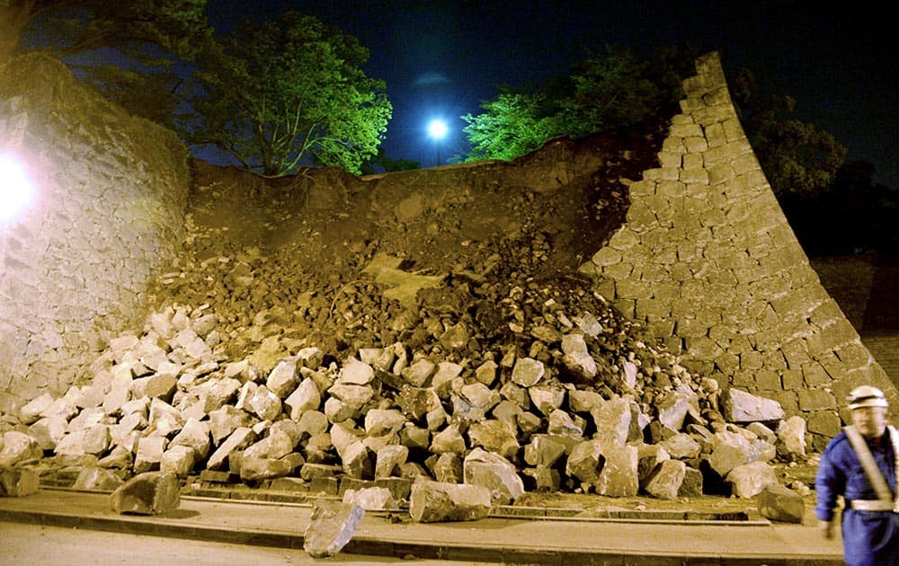 Stone walls of Kumamoto castle fall after an earthquake in Kumamoto, southern Japan.
