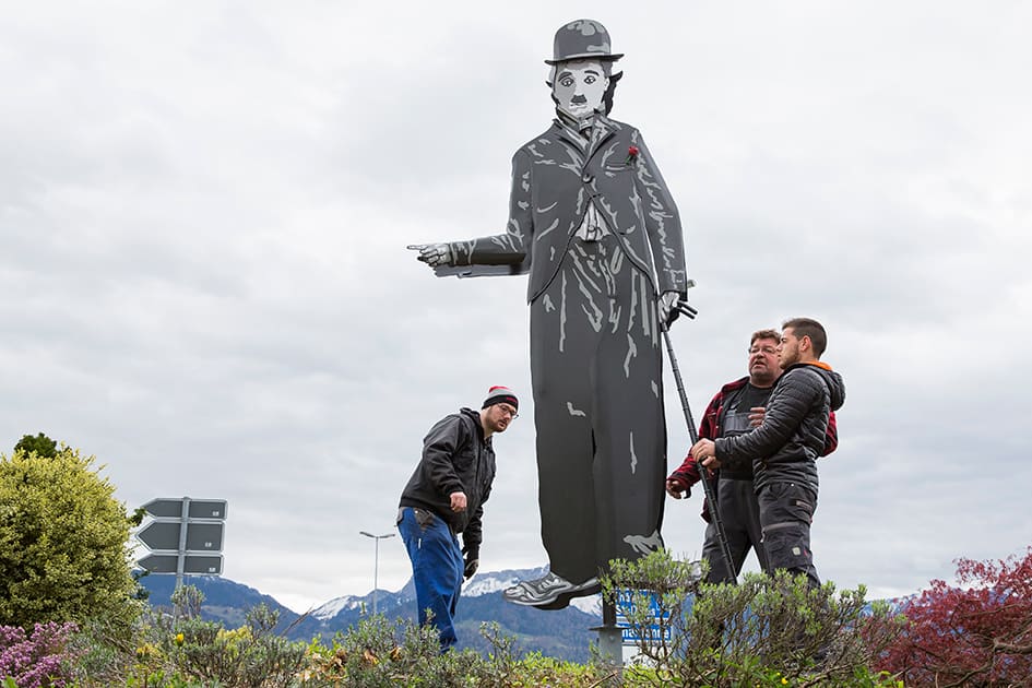 A 3 meter high statue of the actor Charlie Chaplin is set up to show the way to the Manoir de Ban on the eve of the opening of the museum 'Chaplin's World by Grevin' in Corsier-Sur- Vevey, Switzerland.