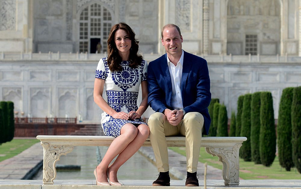 Britain's Prince William, along with his wife, Kate, the Duchess of Cambridge, pose in front of the Taj Mahal in Agra, India.