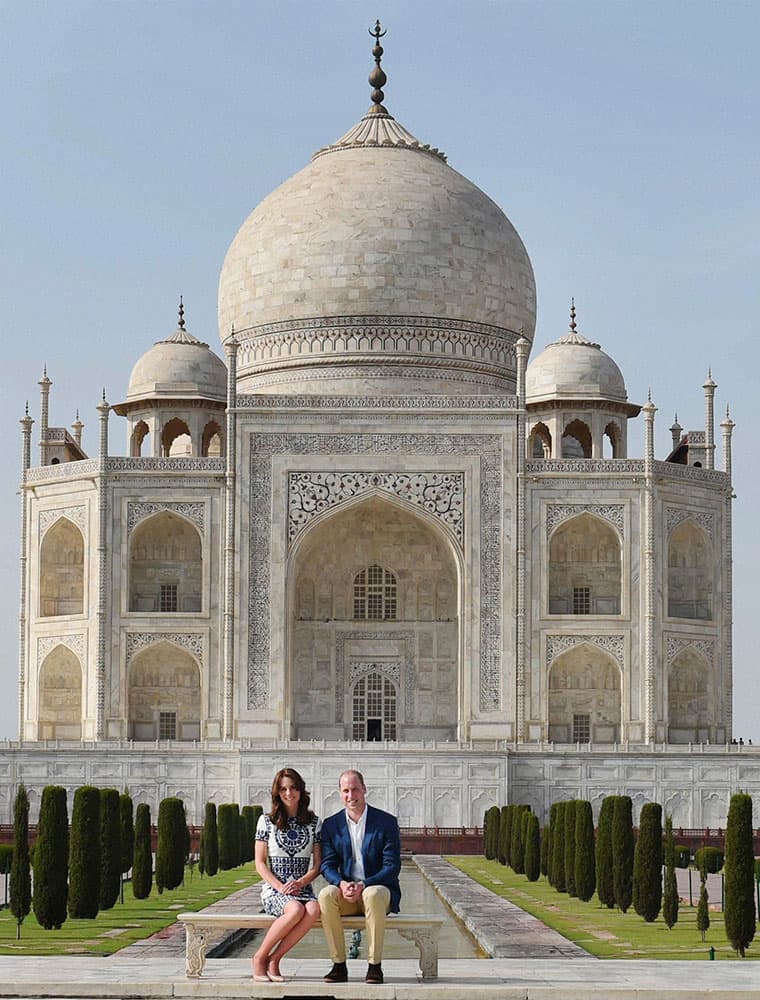 Britain's Prince William, along with his wife, Kate, the Duchess of Cambridge, pose in front of the Taj Mahal in Agra, India.