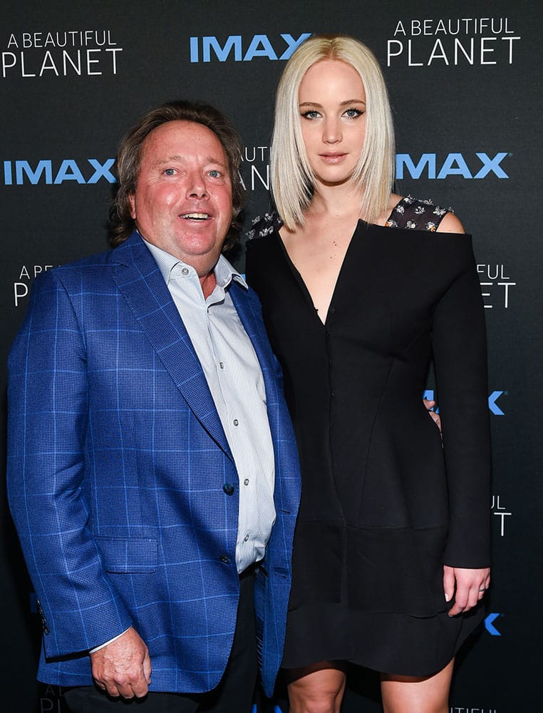 IMAX CEO Richard Gelfond, left, and actress Jennifer Lawrence attend the premiere of 