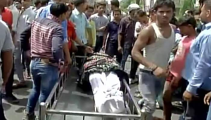 Noida BMW hit-and-run case: Family members, relatives protest with body of deceased