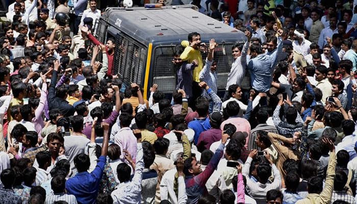 Patel quota stir turns violent, curfew clamped in Mehsana; Gujarat CM urges people to maintain peace