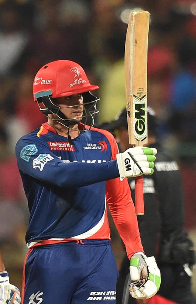 Quinton De Cock of Delhi Daredevils celebrates his fifty runs against Royal Challengers Bangalore during Indian Premier League (IPL) 2016 T20 match in Bengaluru.