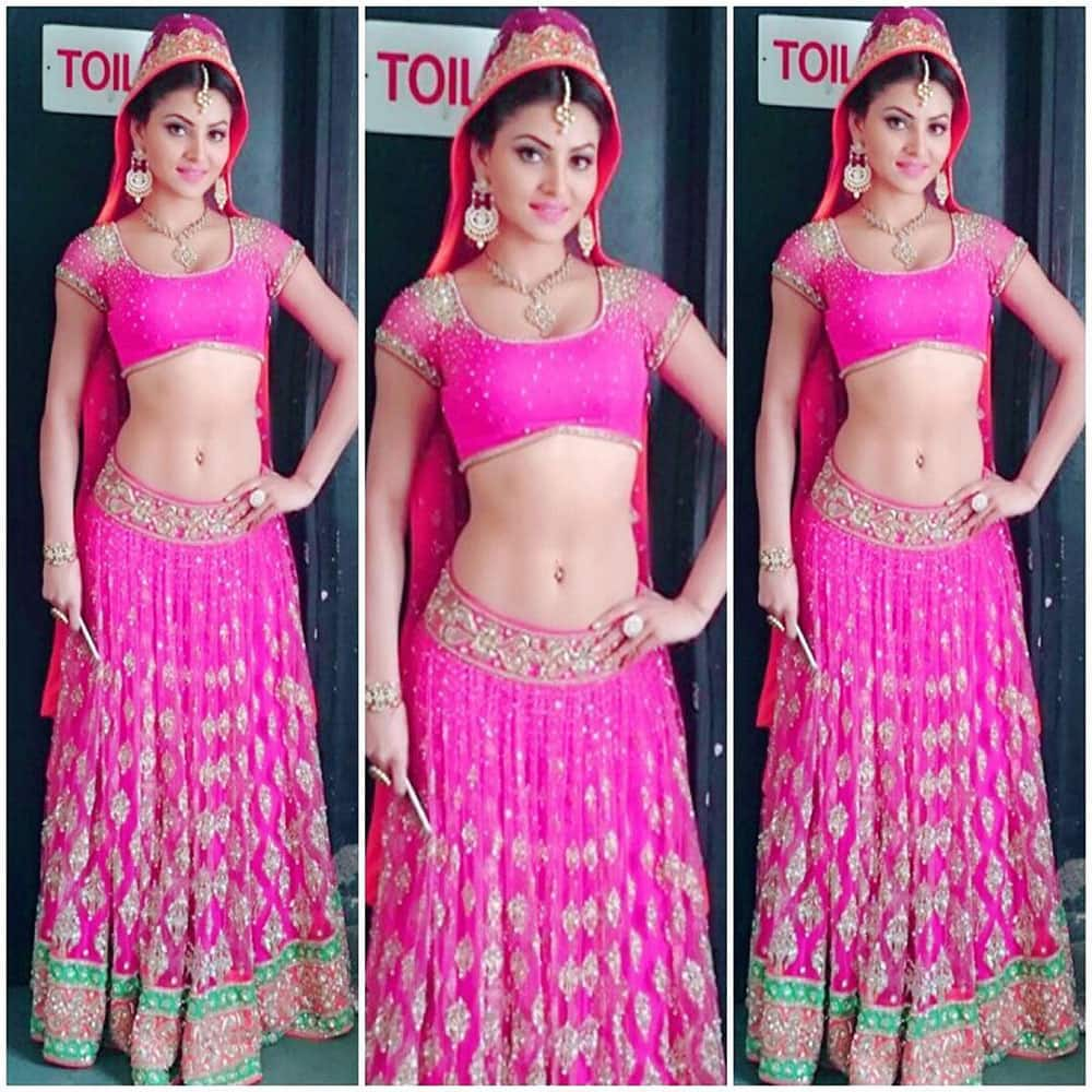 URVASHI RAUTELA :- #happysunday #pink in beautiful @neeta_lulla lehenga #throwback styled by @surabhi_stylefiles -instagram