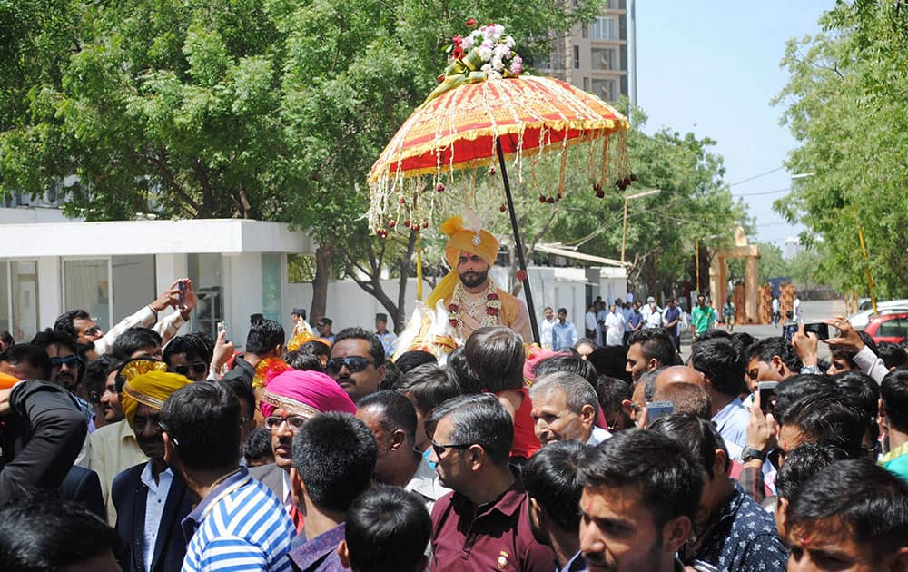 Indian cricketer Ravindra Jadeja during his wedding procession in Rajkot.