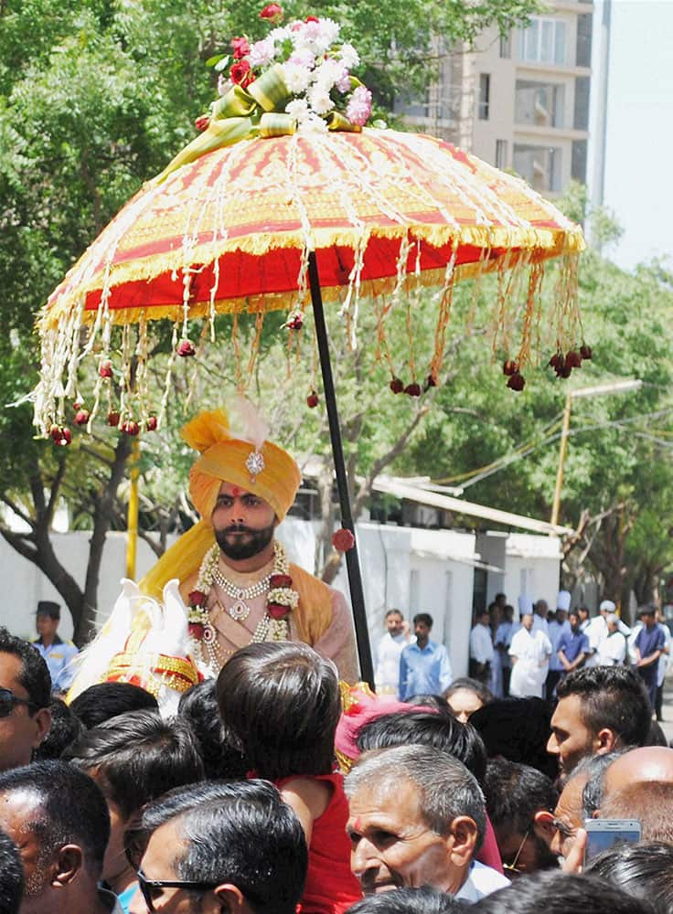 Indian cricketer Ravindra Jadeja during his wedding procession in Rajkot.