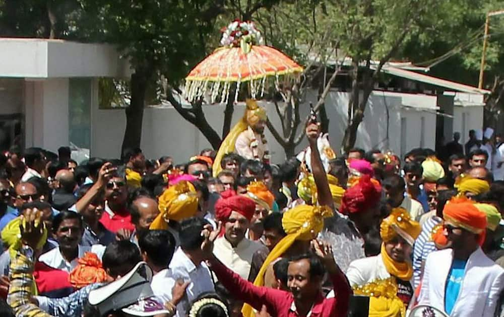 Indian cricketer Ravindra Jadeja during his wedding procession in Rajkot.