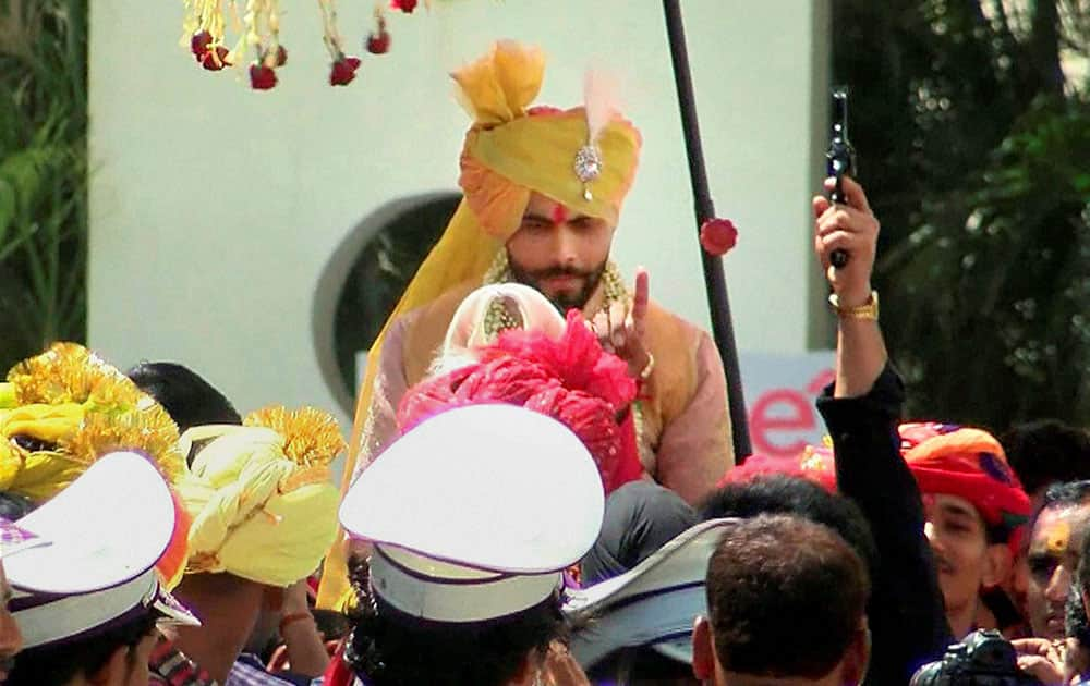 Indian cricketer Ravindra Jadeja during his wedding procession in Rajkot.