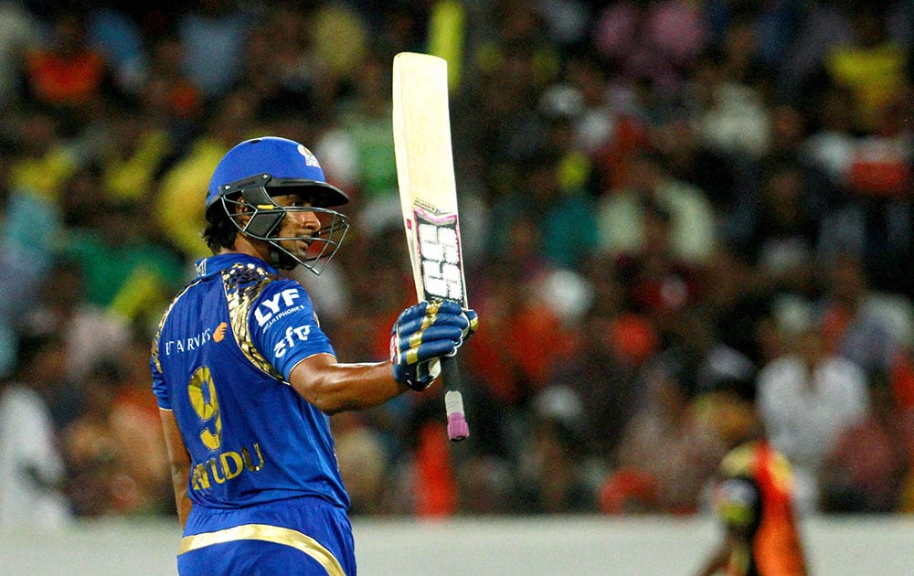 Mumbai Indians Ambati Rayudu raises his bat after scoring fifty runs against Sunrisers Hyderabad during Indian Premier League (IPL) 2016 T20 match in Hyderabad.