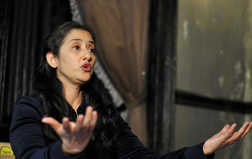 Actress Manisha Koirala addressing media persons in Shimla.