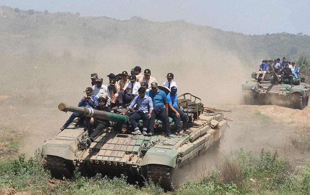 Students from various schools of Mumbai who are on a reverse tour being given a tank ride in Akhnoor.