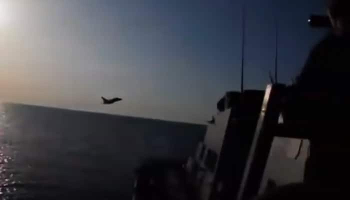 Russian fighter jets in aggressive flyby near US Navy ship - Watch