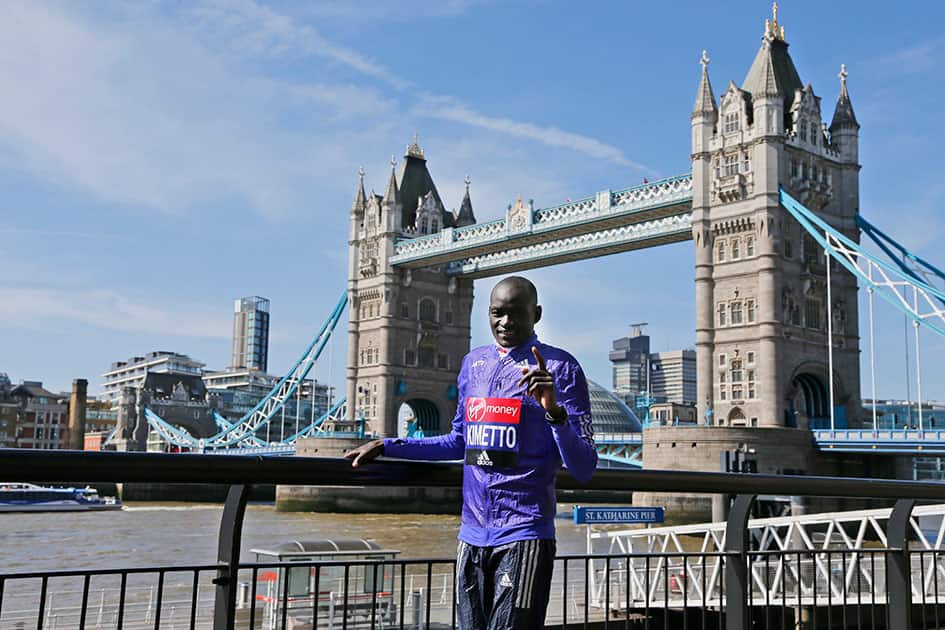 Kenya's Dennis Kimetto poses for photographers ahead of the London marathon, near Tower Bridge in London.
