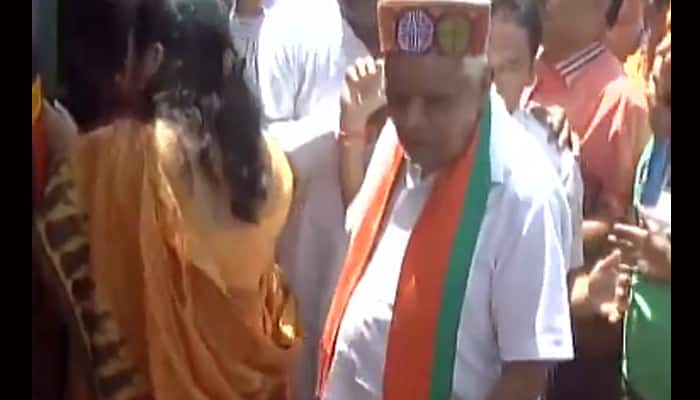 Did MP Home Minister Babulal Gaur inappropriately touch a woman?