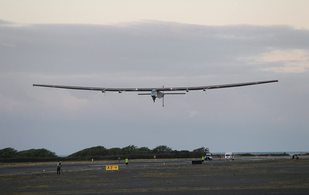 The Solar Impulse 2 solar plane lifts off at the Kalaeloa Airport, in Kapolei, Hawaii.