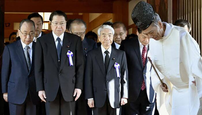 Japanese lawmakers, Cabinet minister visit Tokyo war shrine
