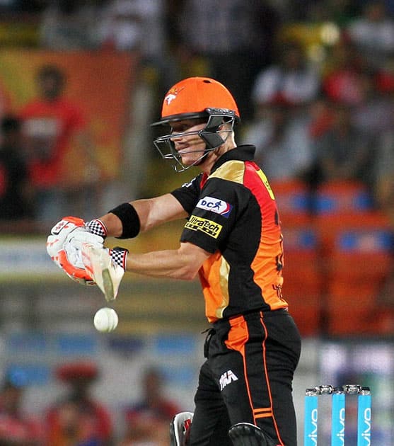 Sunrisers Hyderabad captain David Warner plays a shot agianst Gujarat Lions during their IPL match in Rajkot.