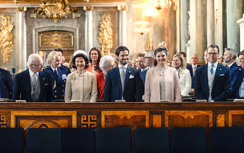 Sweden's King Carl Gustaf, Queen Silvia, Prince Carl Philip, Crown Princess Victoria and Prince Daniel stand before a service for the newly born Prince Alexander in the Church of the Royal Palace in Stockholm, Sweden.