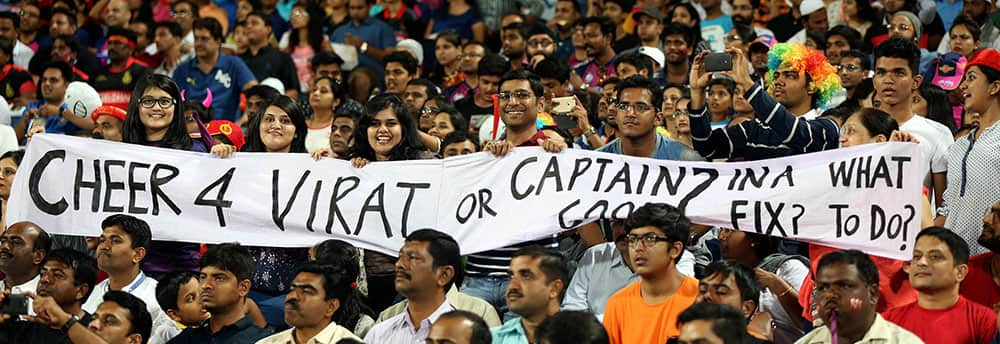 Fans enjoy during their IPL match between Royal Challengers Bangalore and Rising Pune Supergiants at the Maharashtra Cricket Associations International Stadium, Pune.