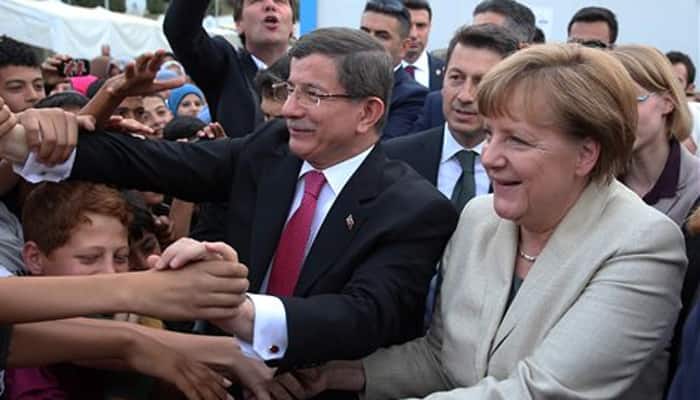 Turkey PM pressures Merkel on visa-free travel in migrant deal