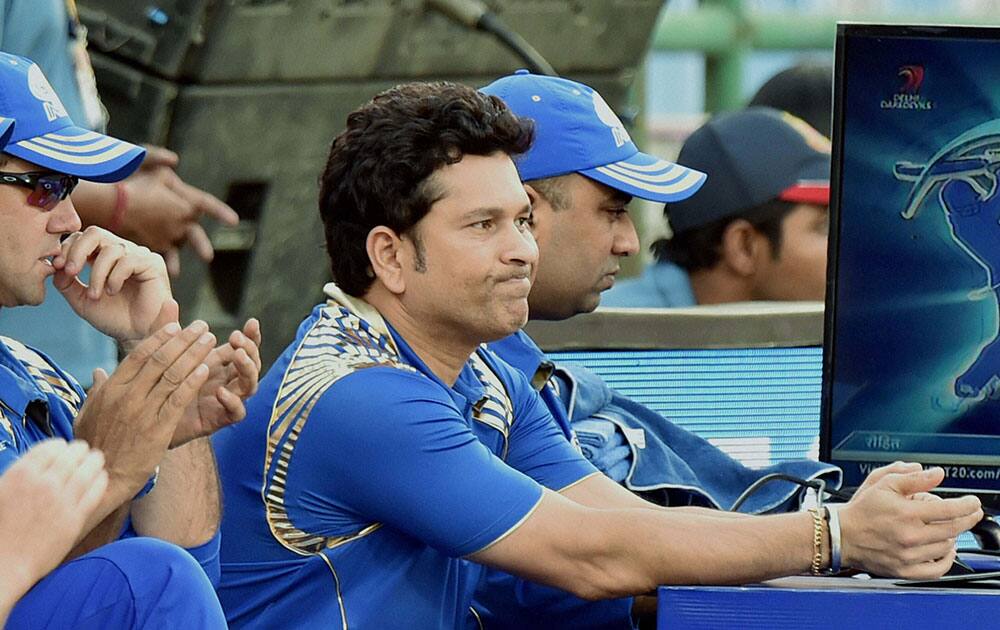 Mumbai Indians mentor Sachin Tendulkar reacts during their IPL T20 match against Delhi Daredevils in New Delhi.