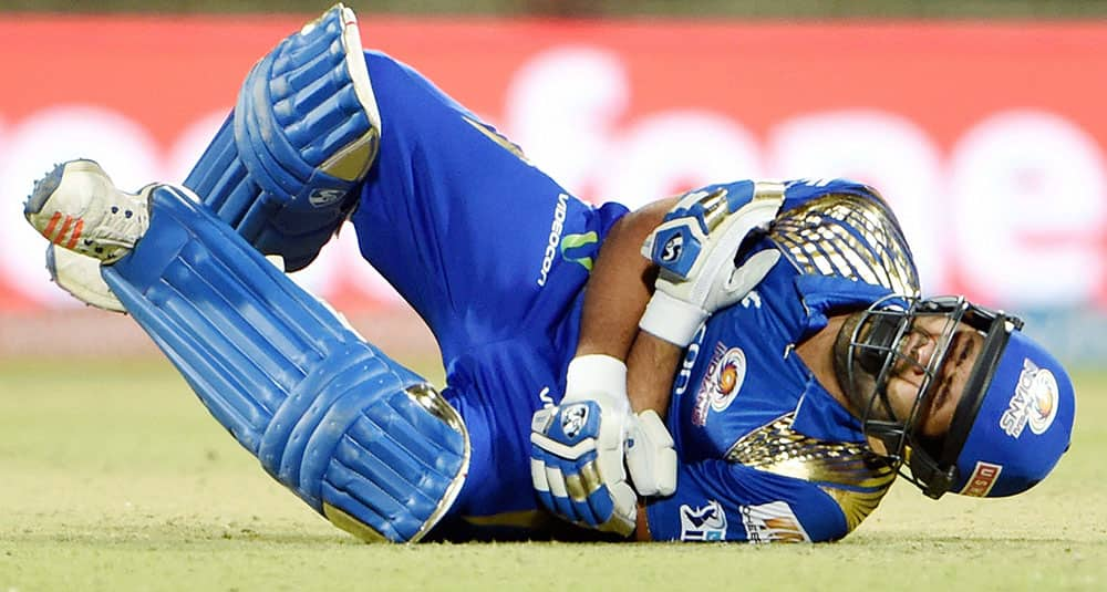 Mumbai Indians Rohit Sharma falls while taking run against Delhi Daredevils during their IPL T20 match in New Delhi.