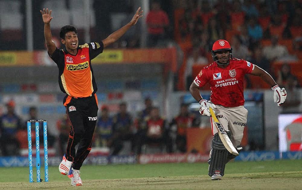 Mustafizur Rahman of Sunrisers Hyderabad appeals for the wicket of Shaun Marsh of Kings XI Punjab during their IPL T-20 match in Huderabad.