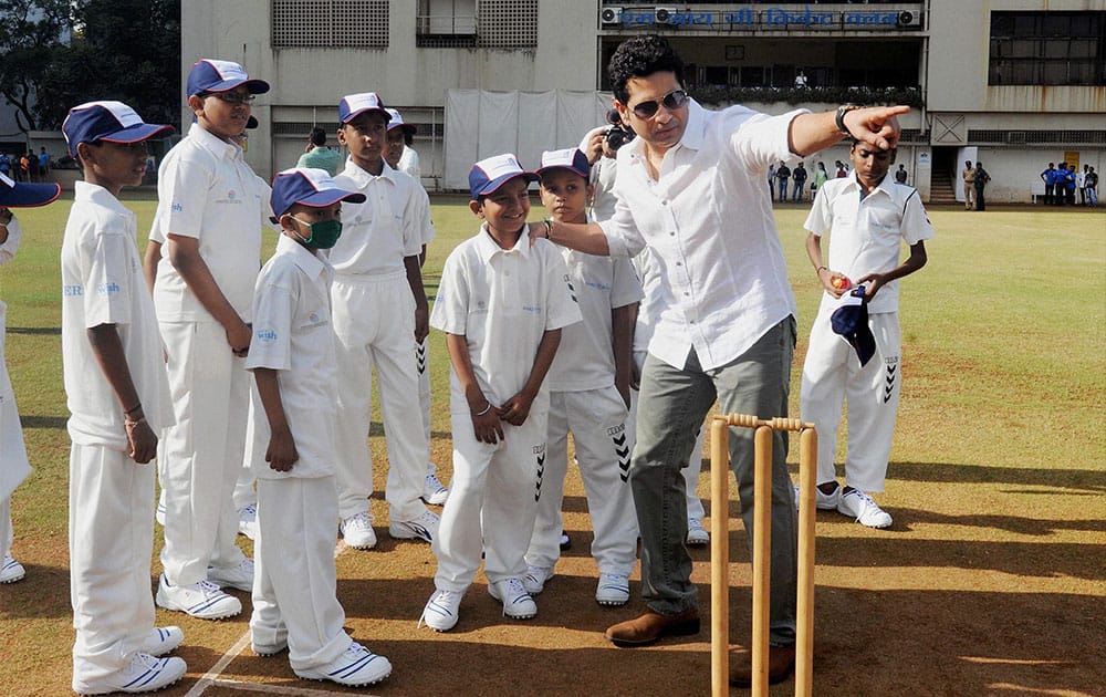 Cricket legend Sachin Tendulkar celebrates his 43rd birthday by playing cricket with children from the Make-A-Wish India organisation in the city in Mumbai.