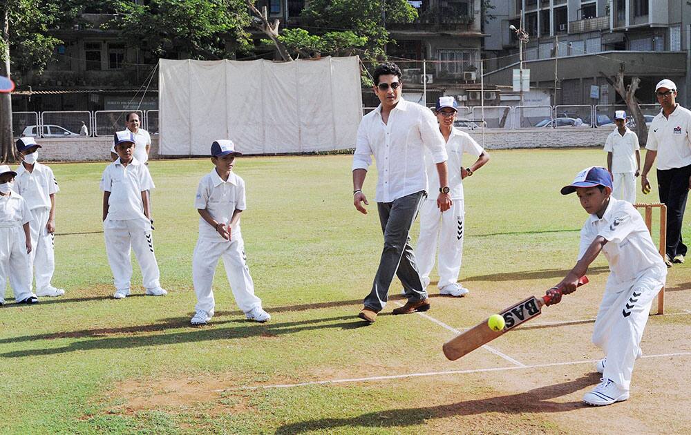 Cricket legend Sachin Tendulkar celebrates his 43rd birthday by playing cricket with children from the Make-A-Wish India organisation in the city in Mumbai.