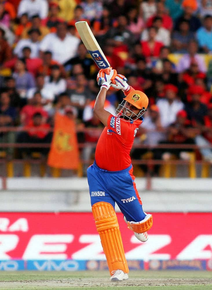 Suresh Raina captain of Gujarat Lions plays a shot during IPL 2016 match against Royal Challengers Bangalore in Rajkot.