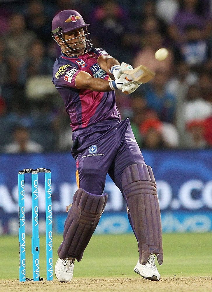 Rising Pune Supergiants captain MS Dhoni pulls for six during an IPLT 20 against Kolkata knight Riders in Pune.