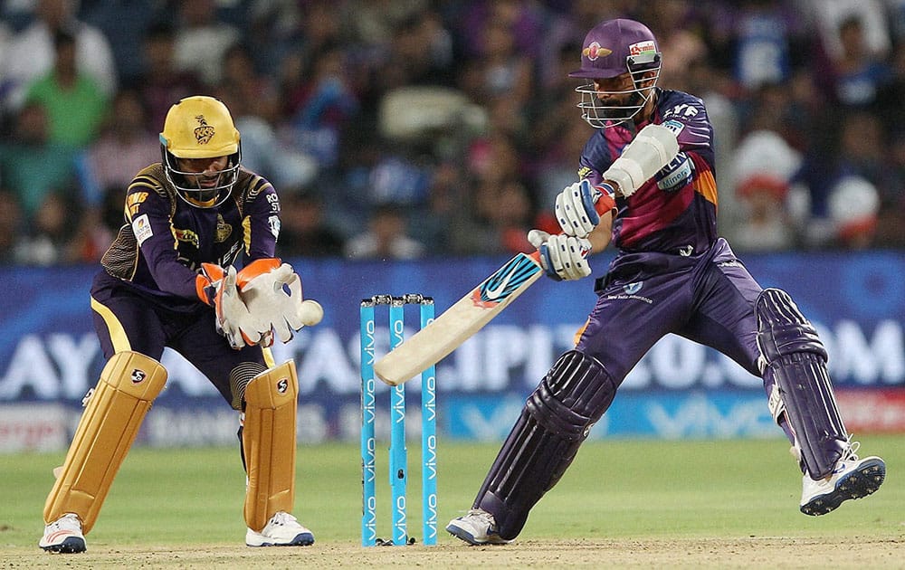 Rising Pune Supergiants Ajinkya Rahane plays a shot during an IPL T 20 against Kolkata knight Riders in Pune.