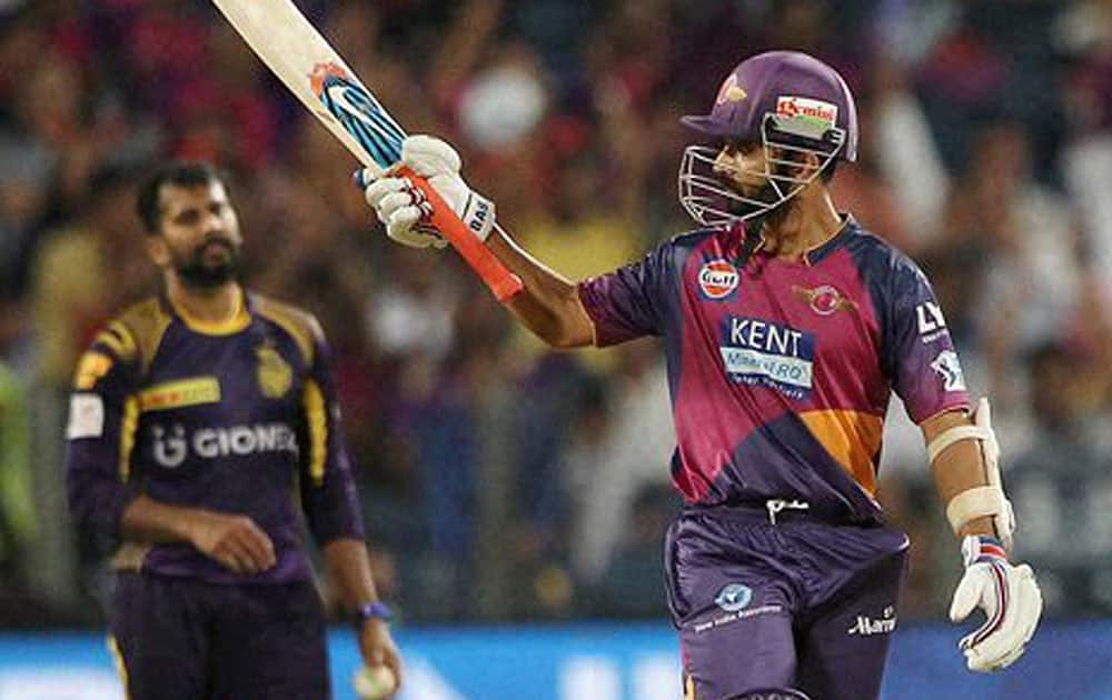 Ajinkya Rahane of Rising Pune Supergiants celebrates his fifty during his T-20 match Kolkata knight Riders in Pune.