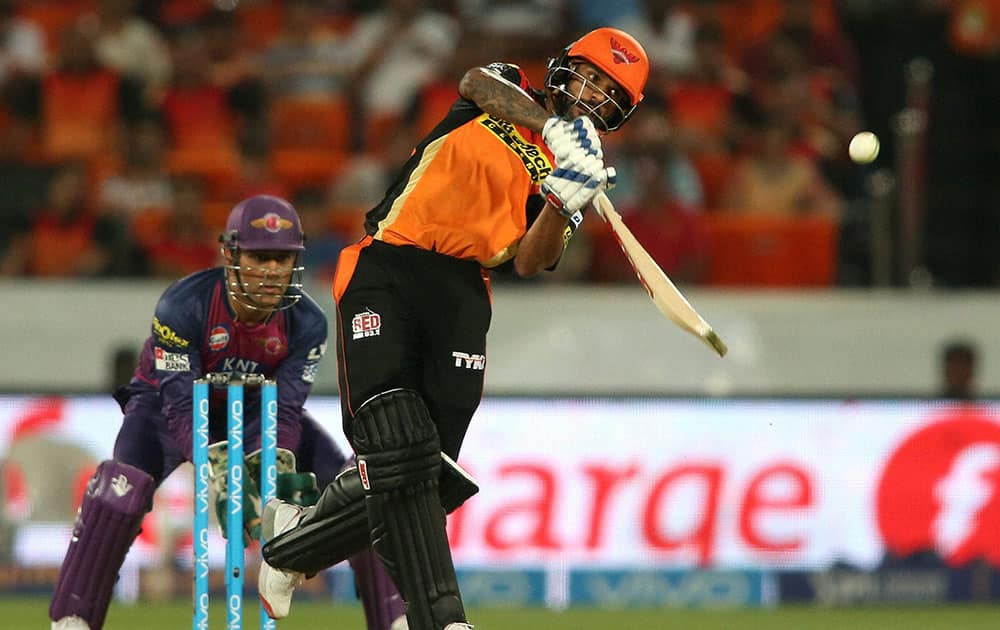 Shikhar Dhawan of Sunrisers Hyderabad plays a shot during an IPL T-20 match against Pune Supergiants in Hyderabad.