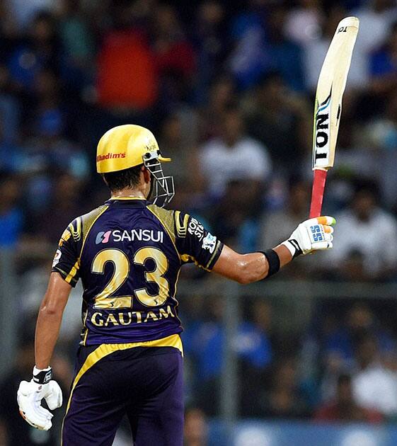 Kolkata Knight riders batsman Gautam Gambhir celebrates his half century during a IPL match played against Mumbai Indians in Mumbai.