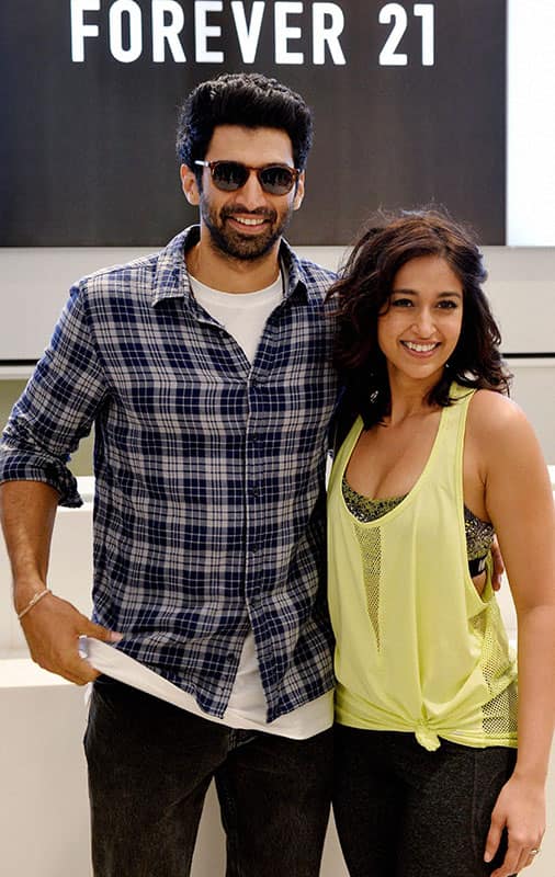 Bollywood actors Aditya Roy Kapoor and Ileana DCruz during inauguration of a showroom at a mall in Bengaluru.