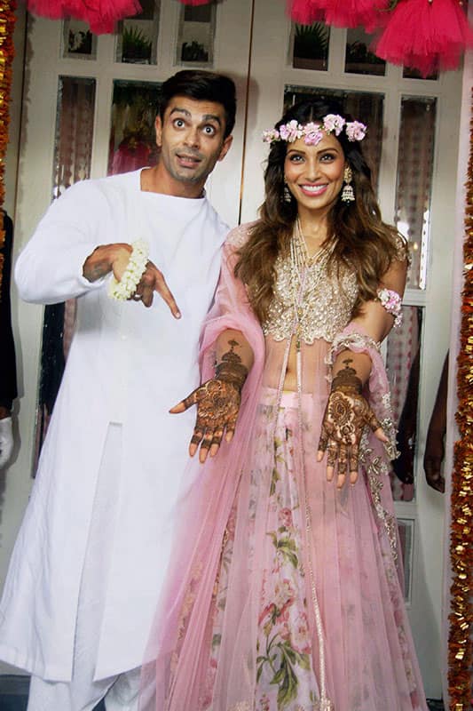 Actors Karan Singh Grover and Bipasha Basu during their Mehendi ceremony in Mumbai.