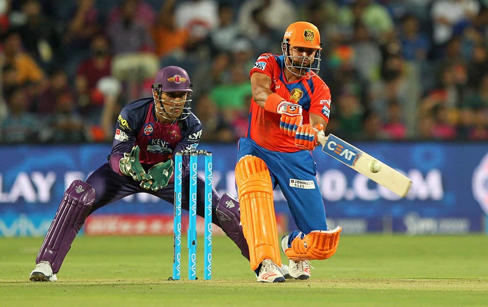 Suresh Raina captain of Gujrat Lions plays a shot during IPL 2016 against Rising Pune Supergiants in Pune.