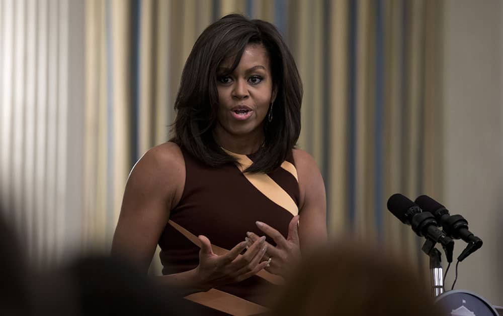 First lady Michelle Obama speaks to high school students from across the Washington D.C. area in State Dining Room of the White House in Washington, as part of the International Jazz Day celebration.