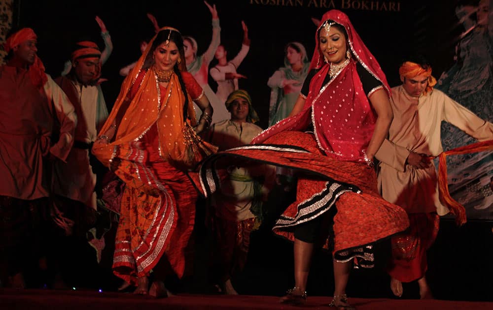 Pakistani artists present folk dance to celebrate the International Dance Day in Lahore.