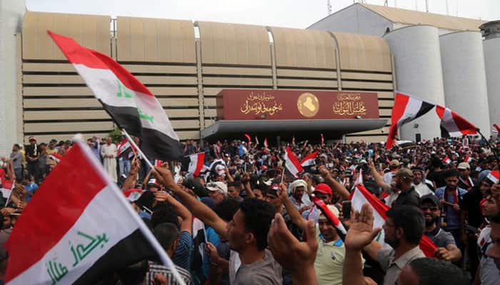 Hundreds of protesters storm Baghdad’s Green Zone, break into Parliament
