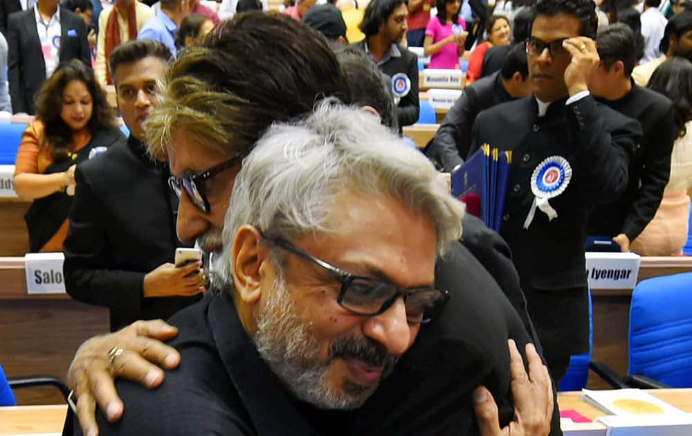 Winner of Best Actor award Amitabh Bachchan and winner of Best Director award Sanjay Leela Bhansali greet each other at the 63rd National Film Awards 2015 function in New Delhi.