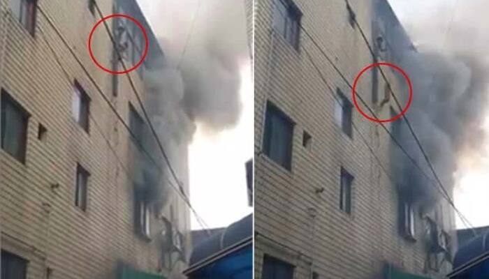 Watch: South Korean mom throws kids out of multi-story building on fire