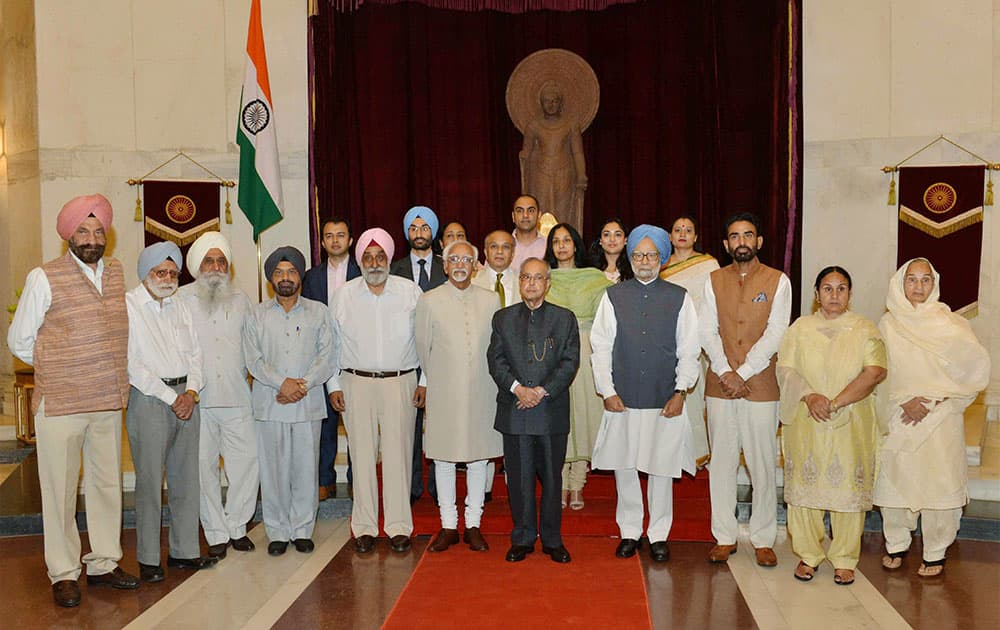  President Pranab Mukherjee with Vice President Hamid Ansari, former PM Manmohan Singh and others at the 100th birthday celebrations of late Giani Zail Singh, former president of India, at Rashtrapati Bhavan in New Delhi.