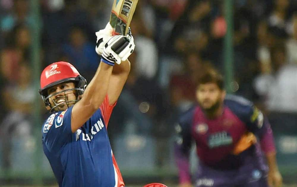 Delhi Daredevils player K K Nair plays a shot during IPL match against Rising Pune Supergiants at Ferozshah Kotla in New Delhi.