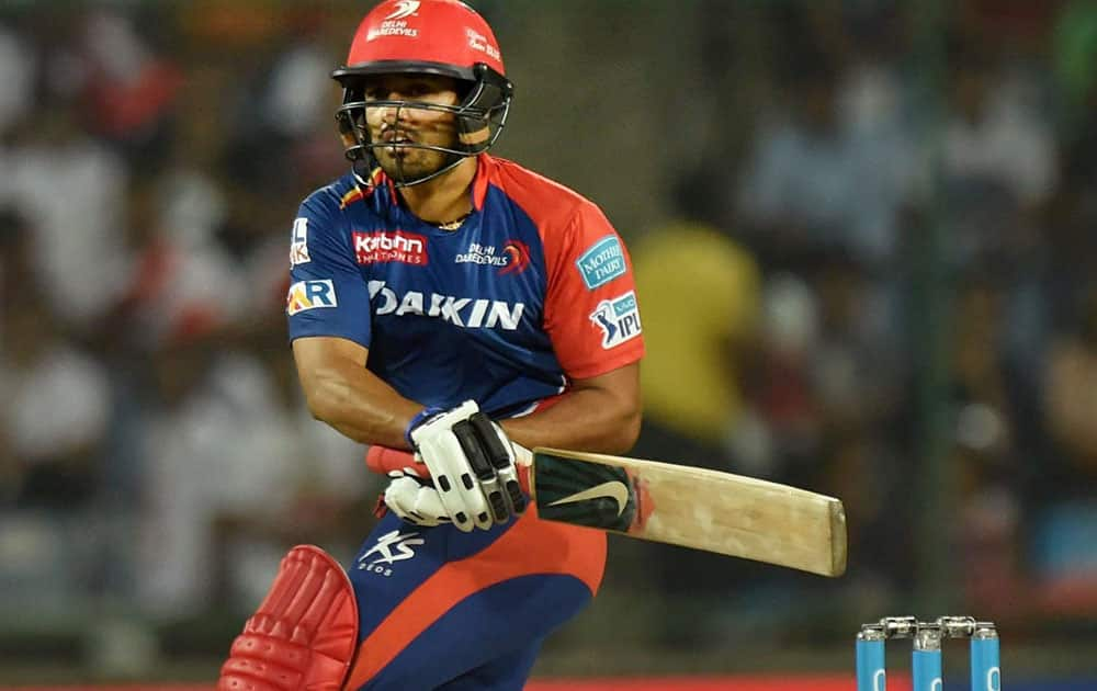 Delhi Daredevils player K K Nair plays a shot during IPL match against Rising Pune Supergiants at Ferozshah Kotla in New Delhi.