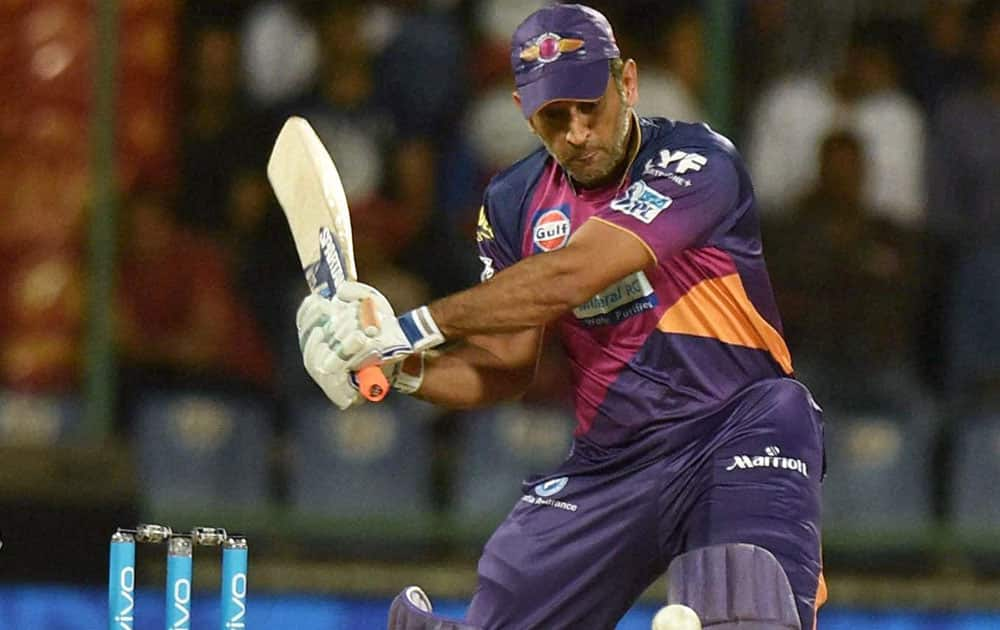 Rising Pune Supergiants player M S Dhoni plays a shot during an IPL T20 match against Delhi Daredevils in New Delhi.