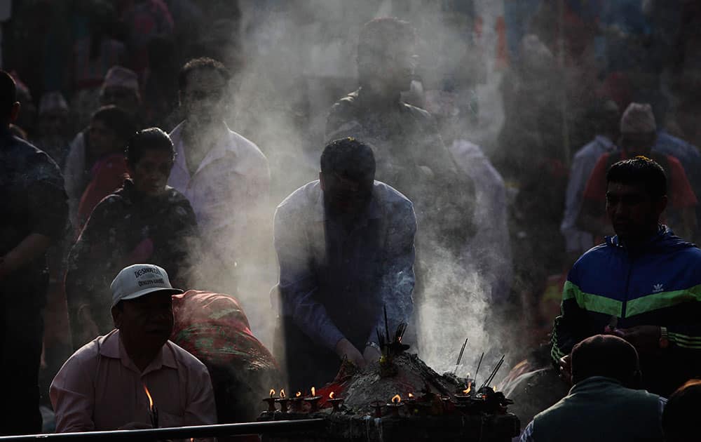 Nepalese Hindu worshippers perform rituals during Matatirtha Aunshi or Mother’s Day at Matatirtha Temple Kathmandu, Nepal. Nepalese Hindus pronounce their affection for their deceased mothers by performing the holy bathing ritual.